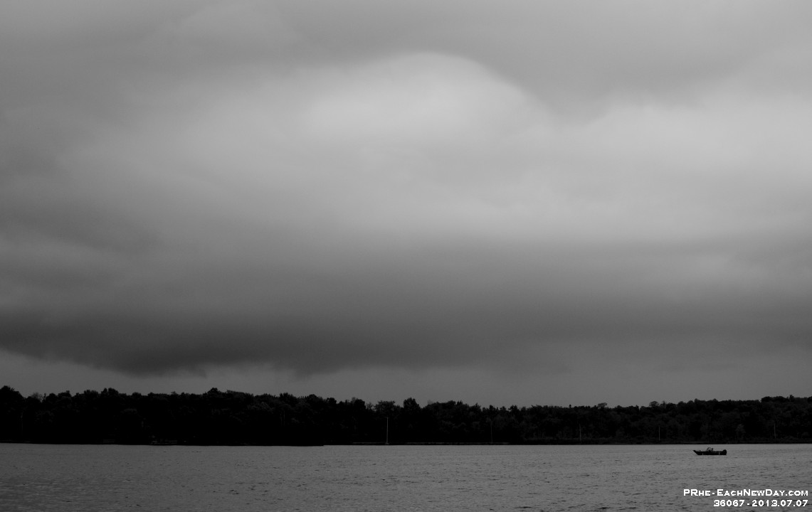 36067RoCrBwLe - A week at the cottage - Fishing boat with storm clouds